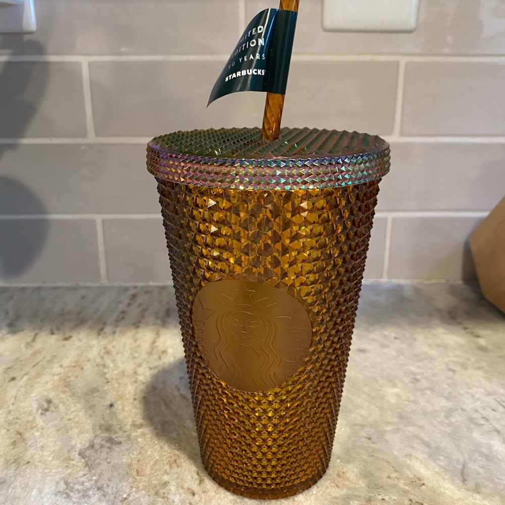 Small gold studded Starbucks cup
